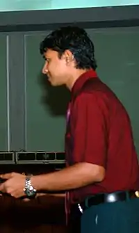 Shafeeu receiving an award