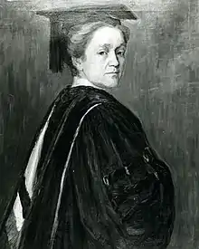 Painting of Eva Johnston in academic dress, looking over her shoulder towards the viewer