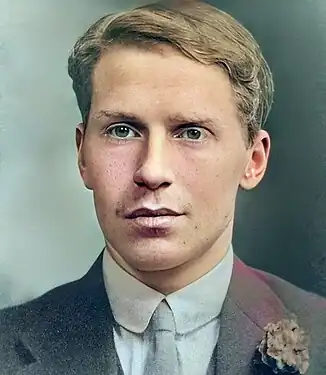 Black and white photograph of young man, aged around 18, with flower in buttonhole, wispy short moustache, Ewart Horsfall in around 1910