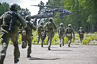 Special Purpose Service board a U.S. Army helicopter during Exercise Flaming Sword 2016