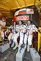 Caldwell Dyson, Skvortsov and Korniyenko in front of their Soyuz TMA-18 spacecraft.