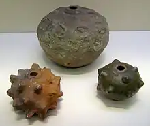 Gunpowder pot and caltrops from the Yuan dynasty.