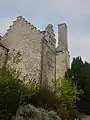 South west crow stepped gable.  South wing with lateral chimney stack.