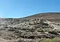 Fairmont Mill ruins on the east side of Fairmont Butte. This mill was one of three that the city ran to produce cement for the Los Angeles Aqueduct.