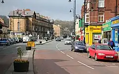 A suburban street with road traffic on