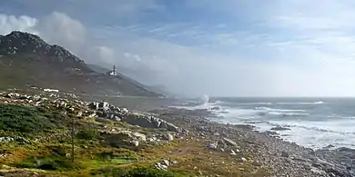 The rocky and misty coast of Cabo Silleiro, Baiona