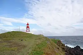 The famous Santa Clara lighthouse (that was once situated on the Tower of Belém) the ex-libris of the small parish