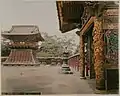 Shiba Chokugaku Mon (back), between 1885 and 1890. Hand-coloured albumen print. View of the Yūshō-in Mausoleum complex showing the bell tower and Chokugaku gate, Zōjō-ji, Tokyo.