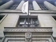 A fasces above the entrance to the building.