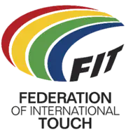 Logo showing a multicolored, stylized, oval-shaped, football. Four approximately concentric crescent shapes (red, yellow, green and blue on a white or light-colored background) are used to form the top and left parts of the ball. The three black capital letters F, I and T (all slightly curved and on the same white or light-colored background) are used for the bottom-right of the ball. The words "Federation of International Touch" (split over three lines of text) are positioned below the stylized ball.