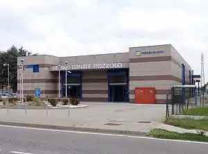 Square two-story building with flat roof