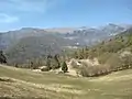 Mount Camiolo di Fondo, barns of the Massa, on the left Massa del Botér, on the right Massa dei Bernàrc, in the background Magasa