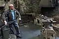 A National Trust volunteer explaining how the foundry operated and was powered