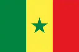 The flag of Senegal, a charged vertical triband.