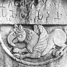 Griffin with Brahmi script inscription.