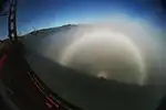 A fog bow, solar glory and Brocken spectre at the Golden Gate Bridge in San Francisco.