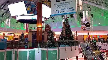 Escalators and Christmas Trees at Plaza del Sol