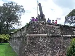 Seri Rambai Cannon and walls viewed from the Esplanade.