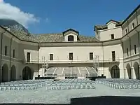 A summer festival performance in the renovated courtyard.