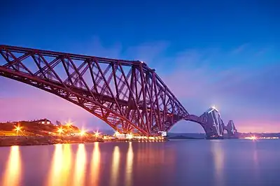 Image 11The Forth Bridge is a cantilever railway bridge over the Firth of Forth. It was opened on 4 March 1890, and spans a total length of 2,528.7 metres (8,296 ft). It is often called the  Forth Rail Bridge or Forth Railway Bridge to distinguish it from the Forth Road Bridge.Photo credit: George Gastin