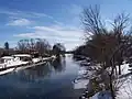 Houses built near the Upper Fox River west of the dam