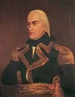 Painting of a man with black eyebrows and white hair pulled back in a queue. He wears a dark blue military uniform and has his right hand stuck between the buttons in Napoleon-style.