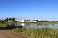 Farm and pond along Schneider Road