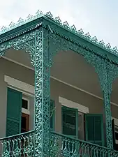 A motif of grapes and vines on the galley of 1127-1129 Chartres Street