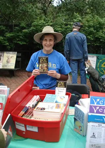 Freya Dinshah at an exhibit table at the Veggie Pride Parade, New York City in 2008