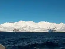 Friesland Ridge from Bransfield Strait; left to right St. Methodius Peak, St. Cyril Peak, Simeon Peak, Paril Saddle, St. Boris Peak, Mount Friesland, Presian Ridge, Catalunyan Saddle and Lyaskovets Peak