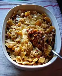 Frito pie prepared in a casserole dish