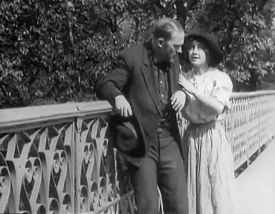 Being rescued on the bridge at beginning of film