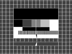 Recreation of the FuBK monochrome variant, omitting the centre circle and replacing the colour bars with a black box showing the transmitter name and channel, as well as an on-screen line gauge replacing the ±V/ +U Ramp and +V/ ±U Anti PAL sections near the bottom.