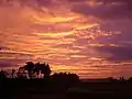 Sunset over the Bates College track in Lewiston, Maine