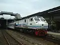 Argo Muria train pulled by locomotive CC203 29 (CC 203 98 17) while waiting for departure at Semarang Tawang Station, 2006