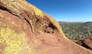 Cave on north side of mountain.