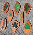 Wooden leaves for a summer nature trail