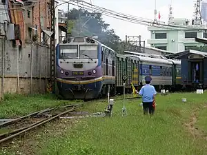 A passenger train departs Ga Sài Gòn station in 2010