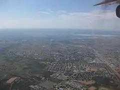 Gaborone from the air, dam in the distance