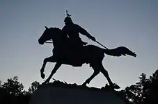 Statue of General Gang in silhouette.