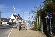 Access to the station is near the level crossing.