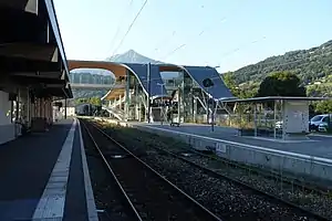 Double-tracked railway line with side platforms