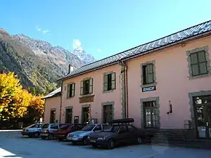 Wide two-story building with gabled roof