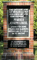 Commemorative plaque in front of St Mary Magdalene’s parish on 22 Platanenstraße street in Berlinie-Niederschönhausen, in memorial of priest Josef Lenzel, that gave his life for Poles – brothers in faith