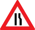 8c: Road narrows from right side