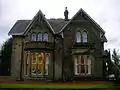 The side of the house which faces Geilsland Road and Spier's school grounds.