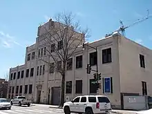 Vacant brick and terra cotta commercial-industrial building in a modern/Art Deco architectural style