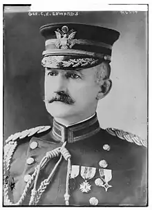 A black and white image showing Edwards in his military uniform with medals.