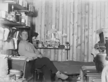 George Percy Abbott sitting on his bunk