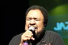 George Duke sings on stage in 2010.